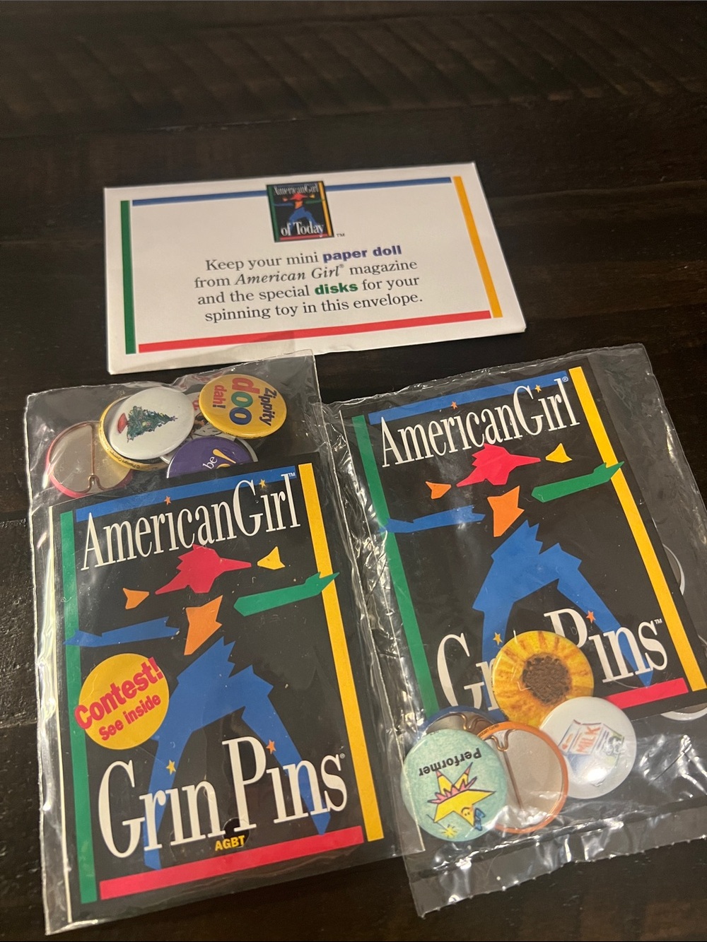 American Girl Grin Pins Pack with Bright Multicolor Artwork on Black